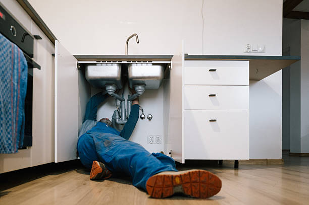 Professional Drain Cleaning technician working in Charleston, MO
